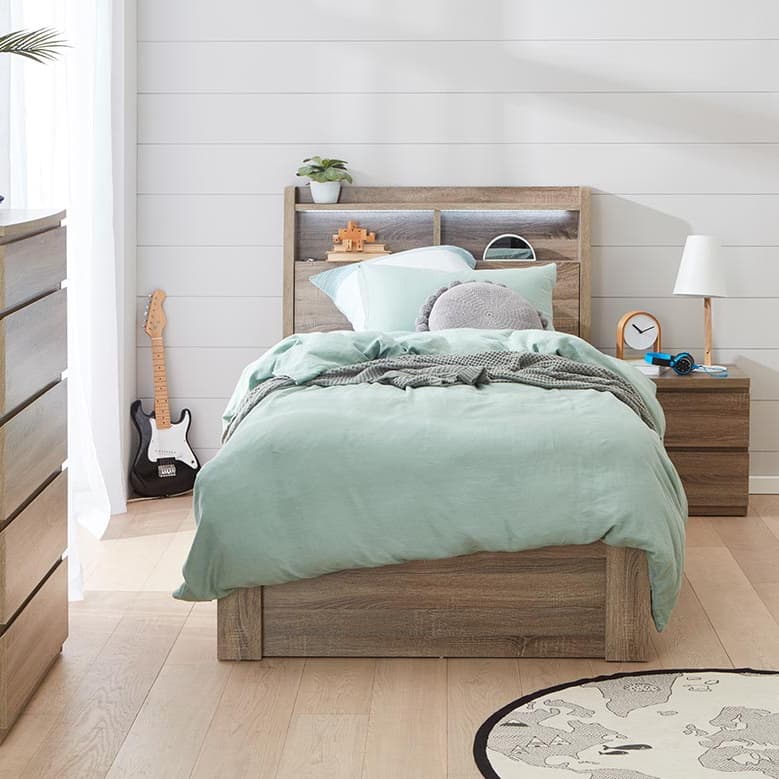 Lifestyle image of the  Ellipse Mocha Qb Bed W/Front Slat Gas Lft from Forty Winks