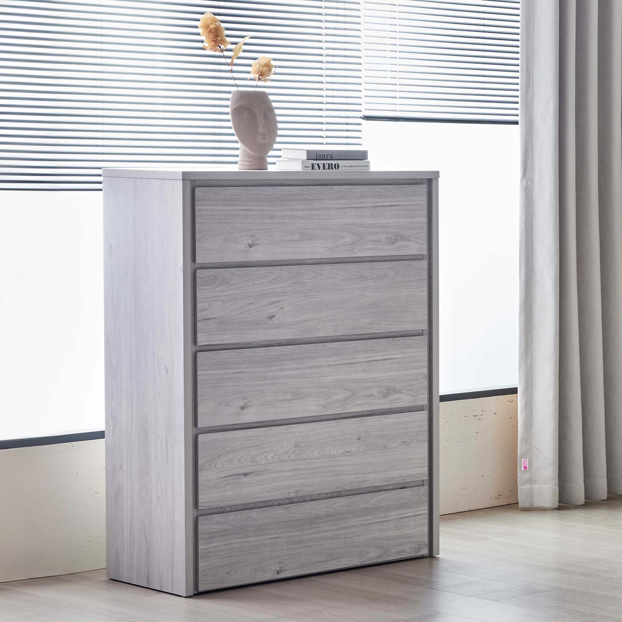 Lifestyle image of the  Nova Stone Oak Tallboy 5 Drawer from Forty Winks