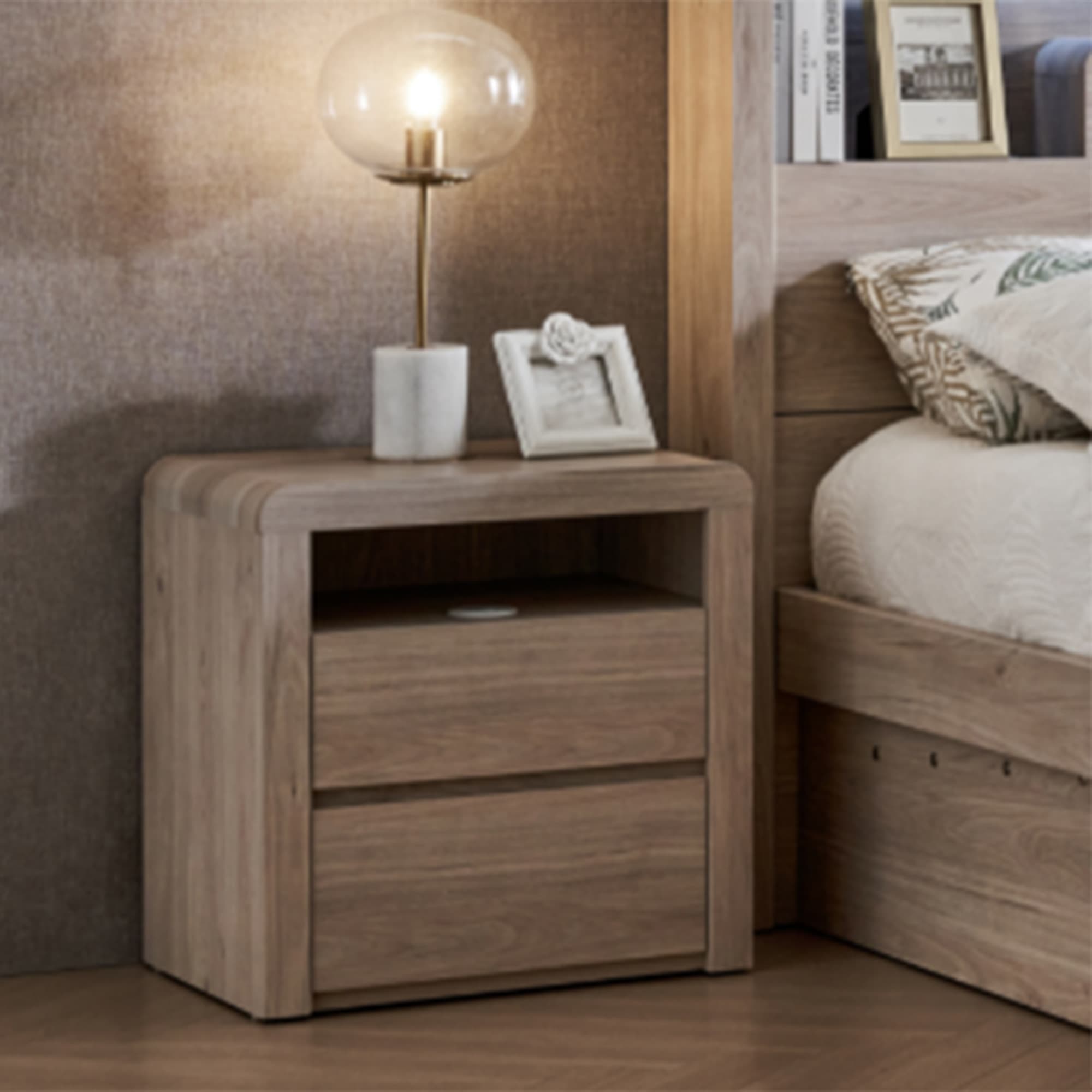 Lifestyle image of the  Aria (Milan Oak) Bedside Table 2 Drawer W/Usb Charger from Forty Winks