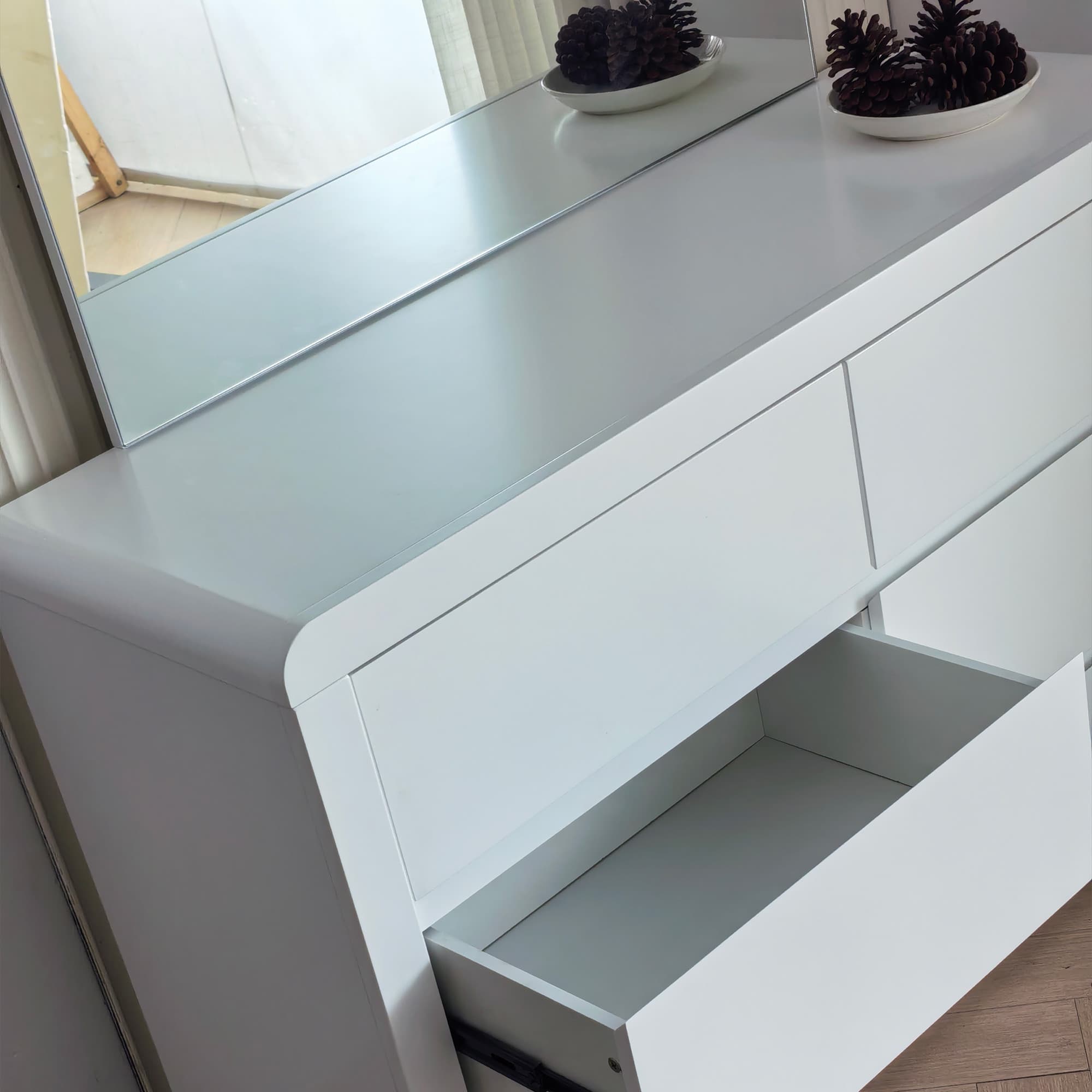 Lifestyle image of the  Aria (Ivory White) Dresser Table 6 Drawer from Forty Winks