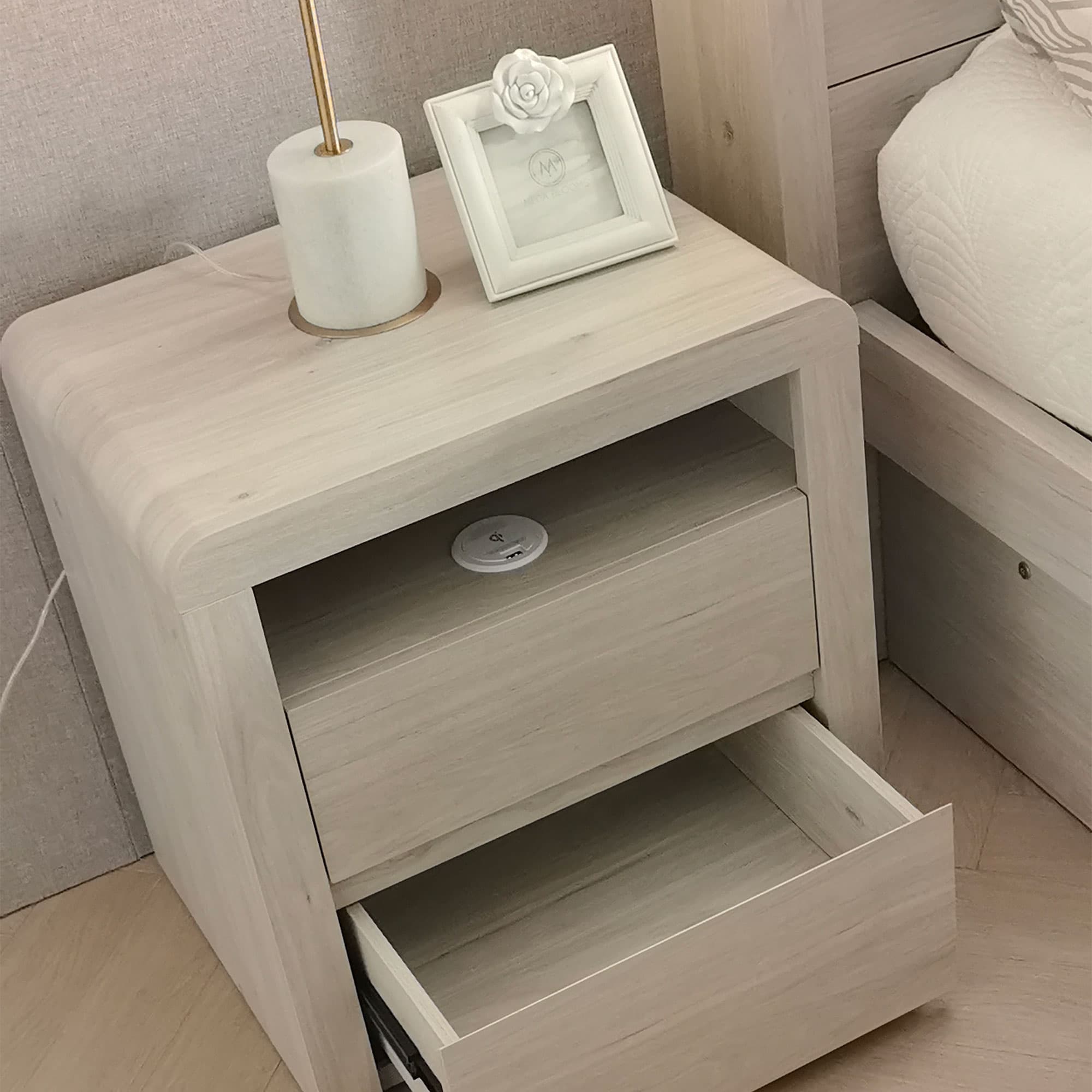 Lifestyle image of the  Aria (Milan Oak) Bedside Table 2 Drawer W/Usb Charger from Forty Winks