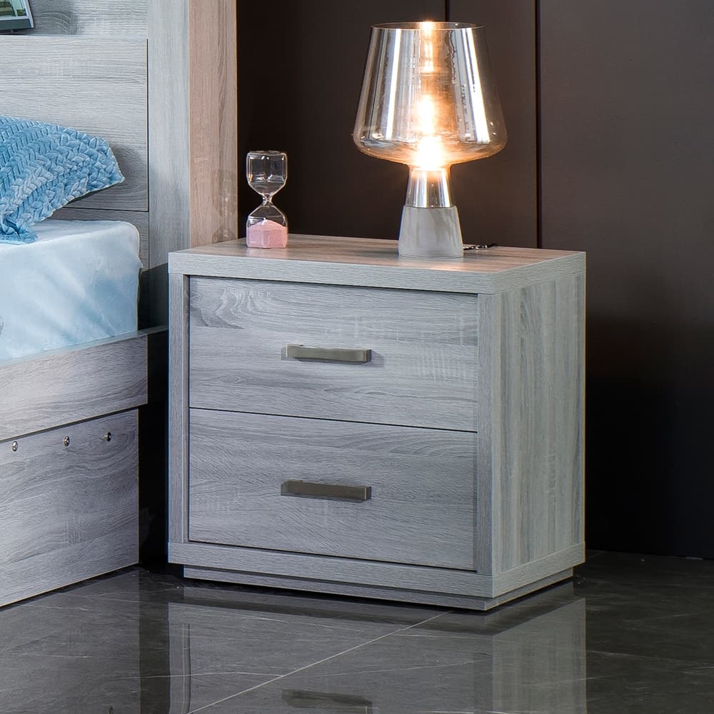 Lifestyle image of the  Bellevue Cement Grey Bedside Table from Forty Winks