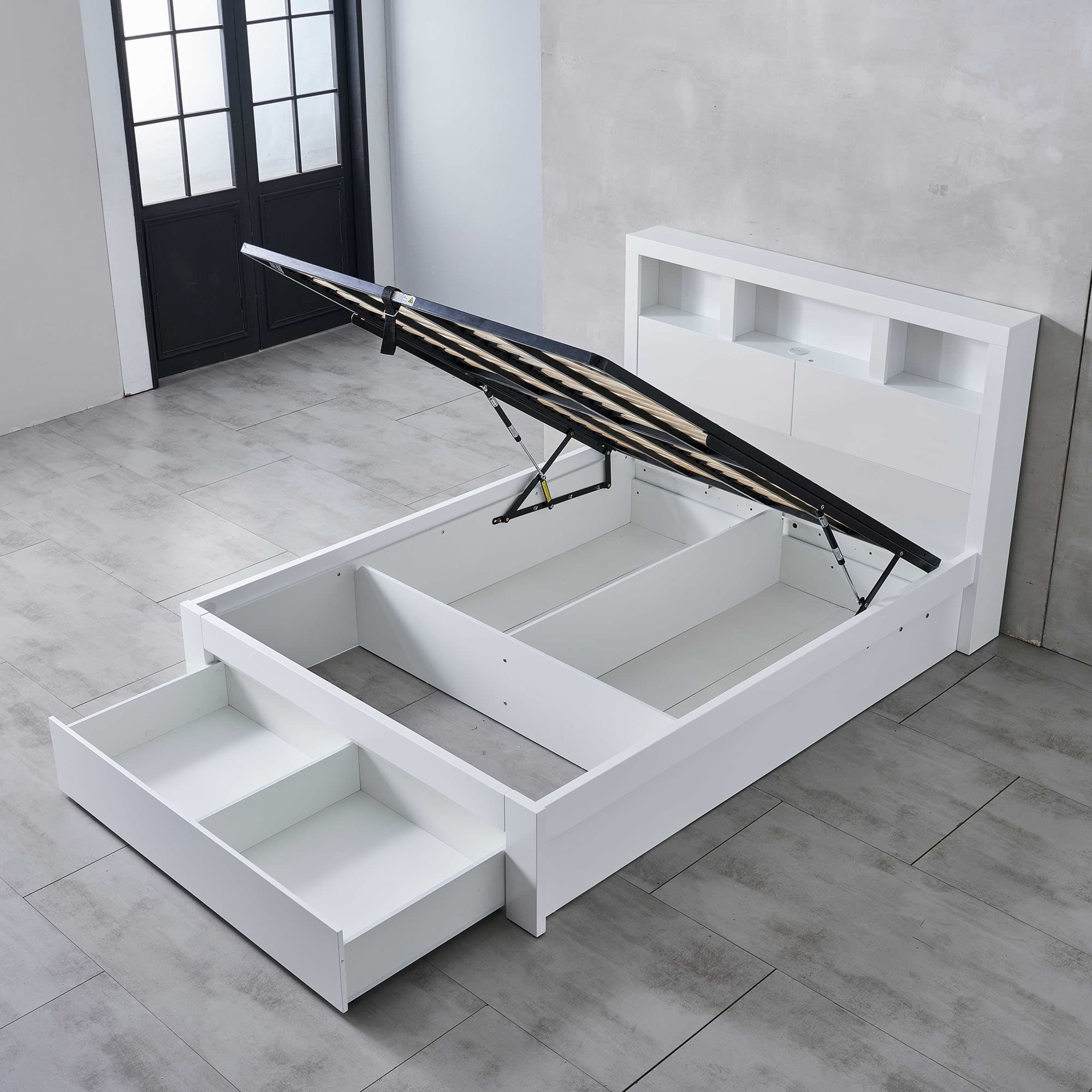 Lifestyle image of the  Lugano Ivory White Qb Bed W/Front Slat Gas Lift & End Drawer Base from Forty Winks