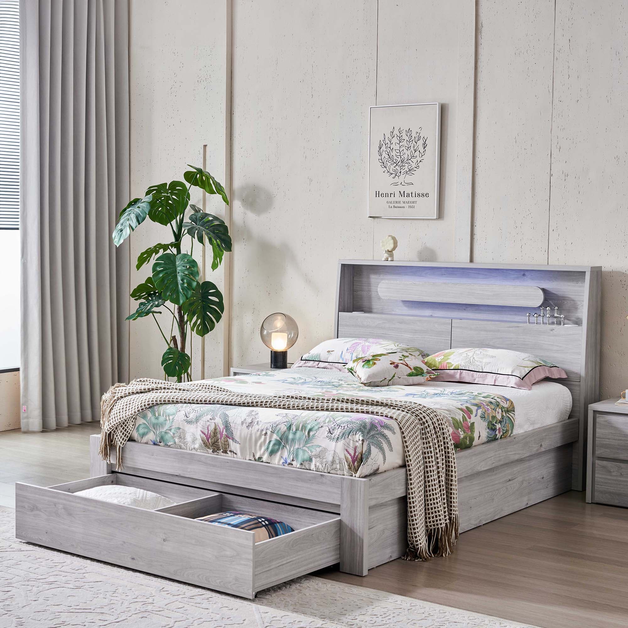 Lifestyle image of the  Nova Stone Oak Qb Bed W/Side Board Lift & End Drawer from Forty Winks
