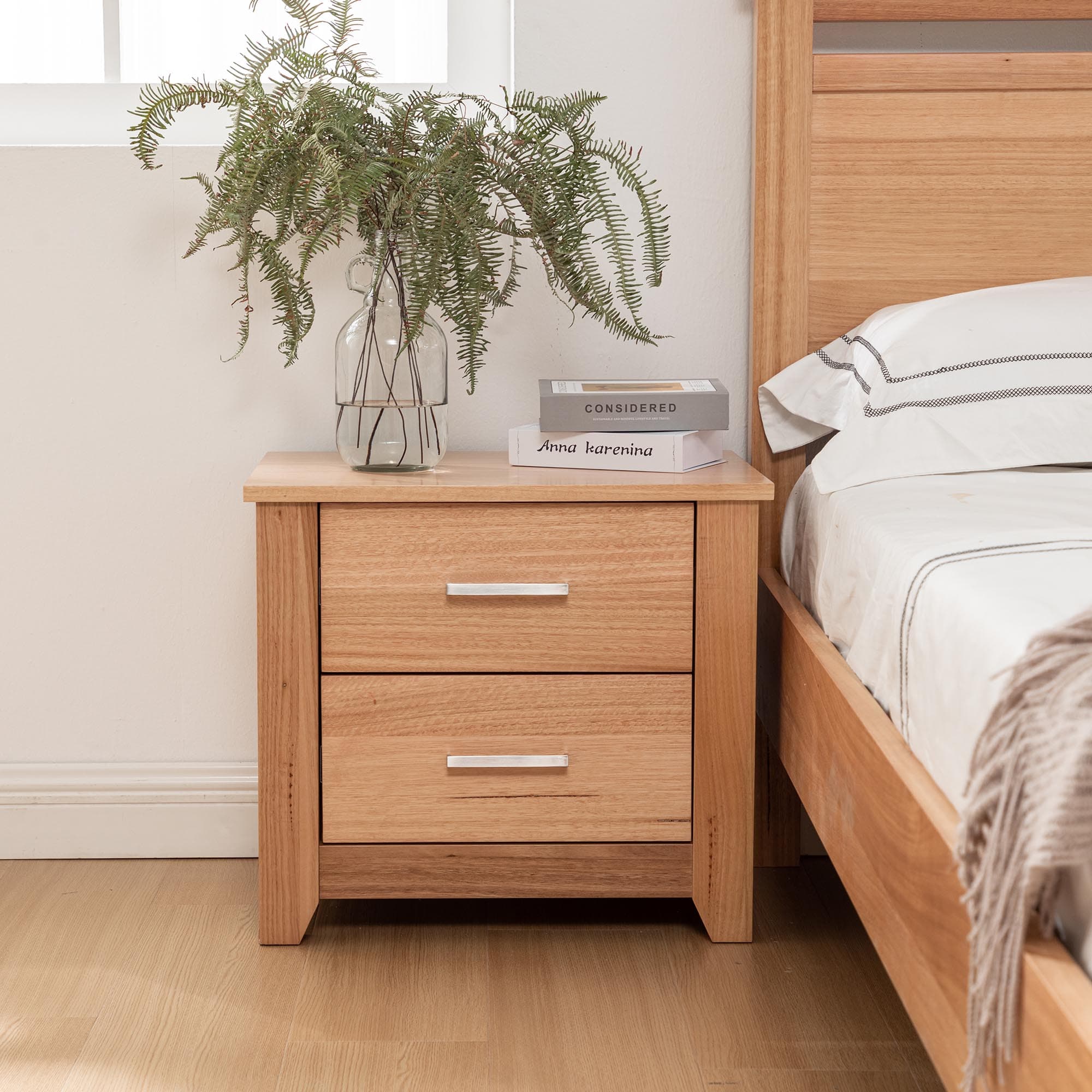 Lifestyle image of the  Portland (Natural) Bedside Table 2 Drw from Forty Winks