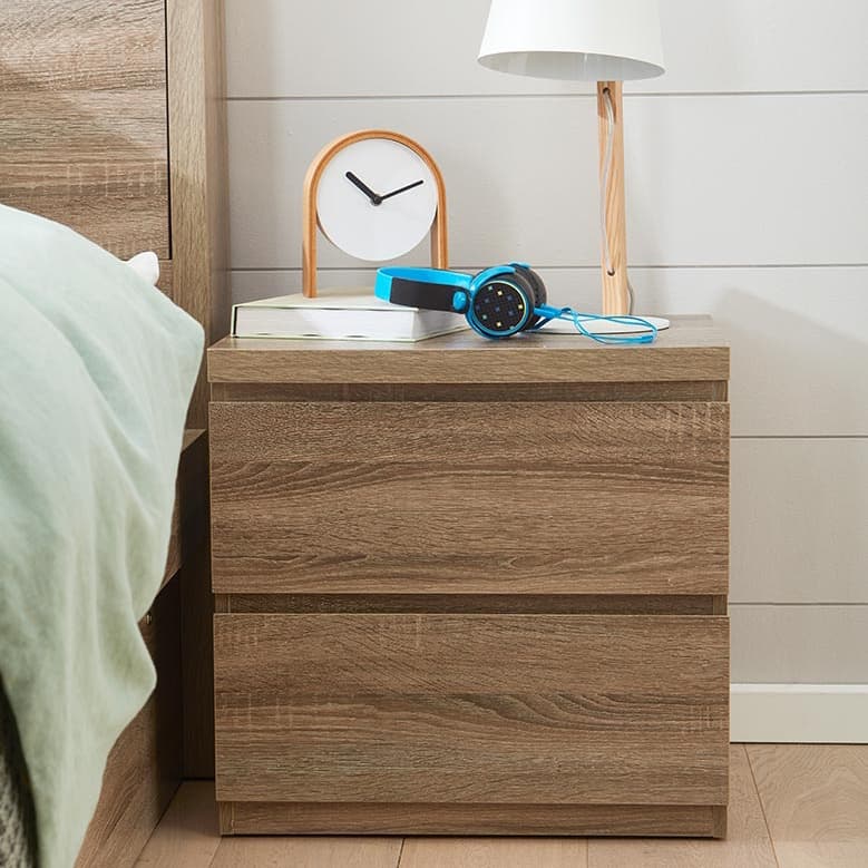 Lifestyle image of the  Ellipse Mocha Bedside Table from Forty Winks