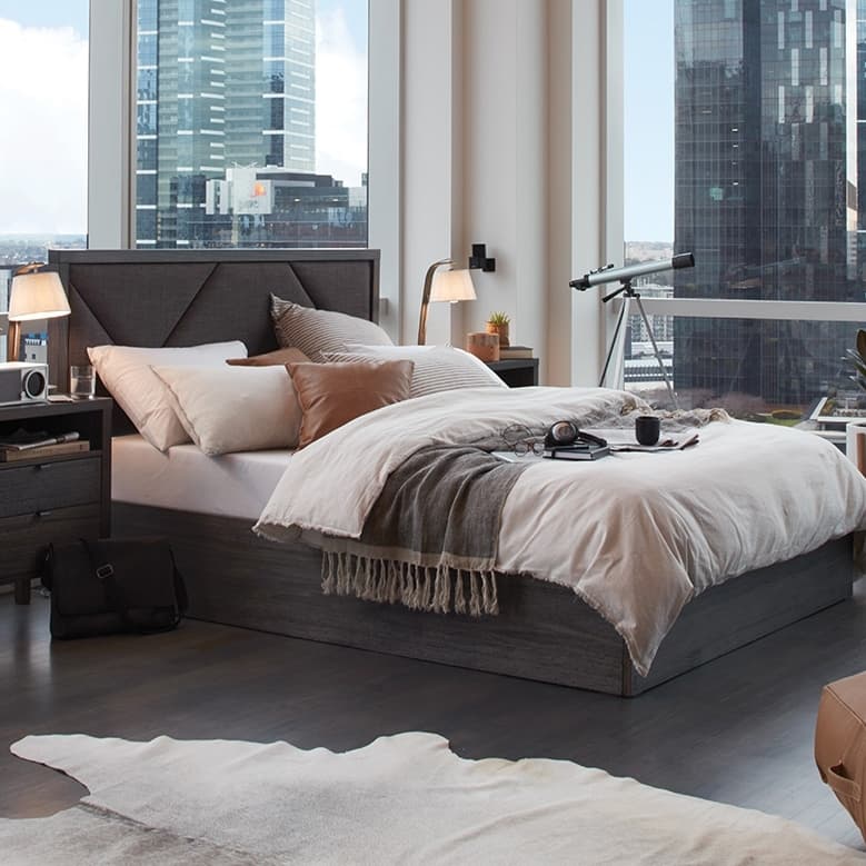 Lifestyle image of the  City X Qb Bedhead Tile Upholstered W/Border (Charcoal, Cargo Graphite) from Forty Winks