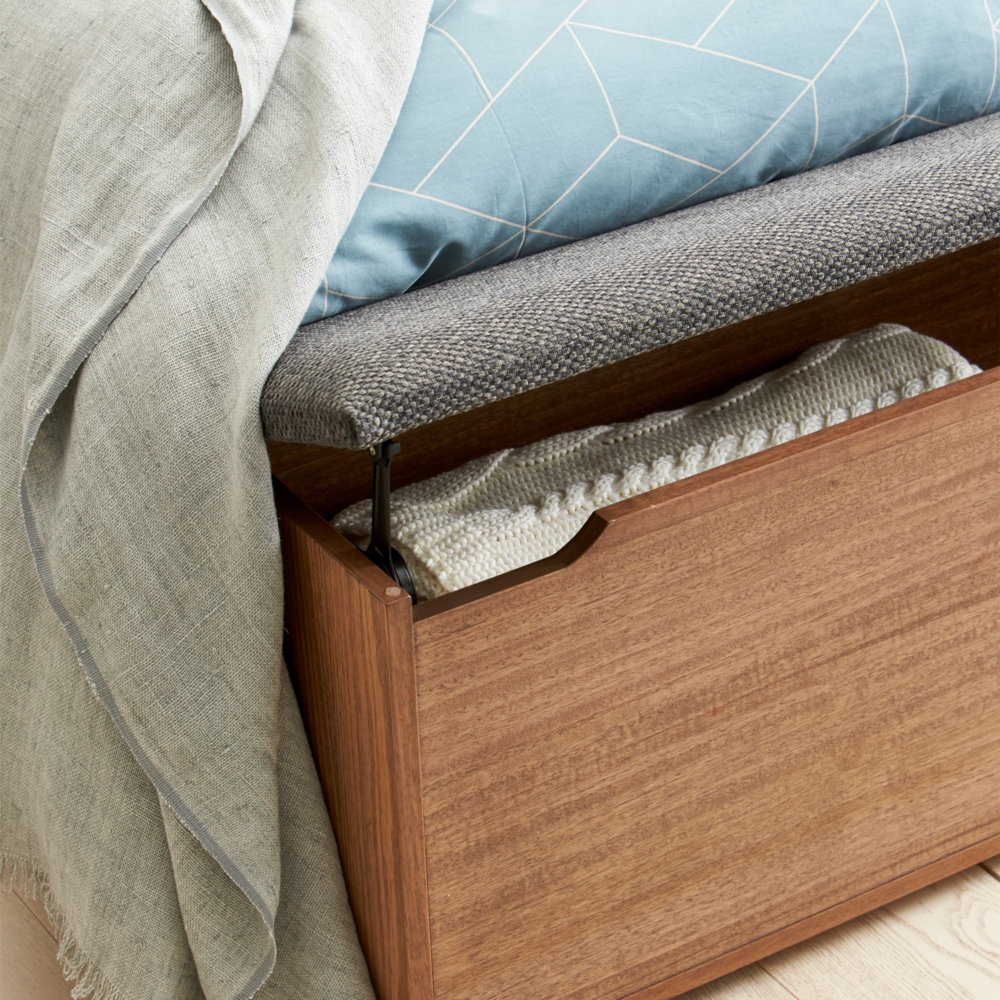 Lifestyle image of the  Lincoln Qb Bed W/Upholstered Head, Storage Foot Box (Latte, Warwick Checkmate Slate) from Forty Winks