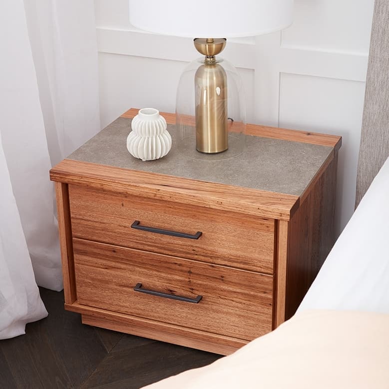 Lifestyle image of the  Alexa Bedside Table 2 Drawer W/Stone Top (Native) from Forty Winks