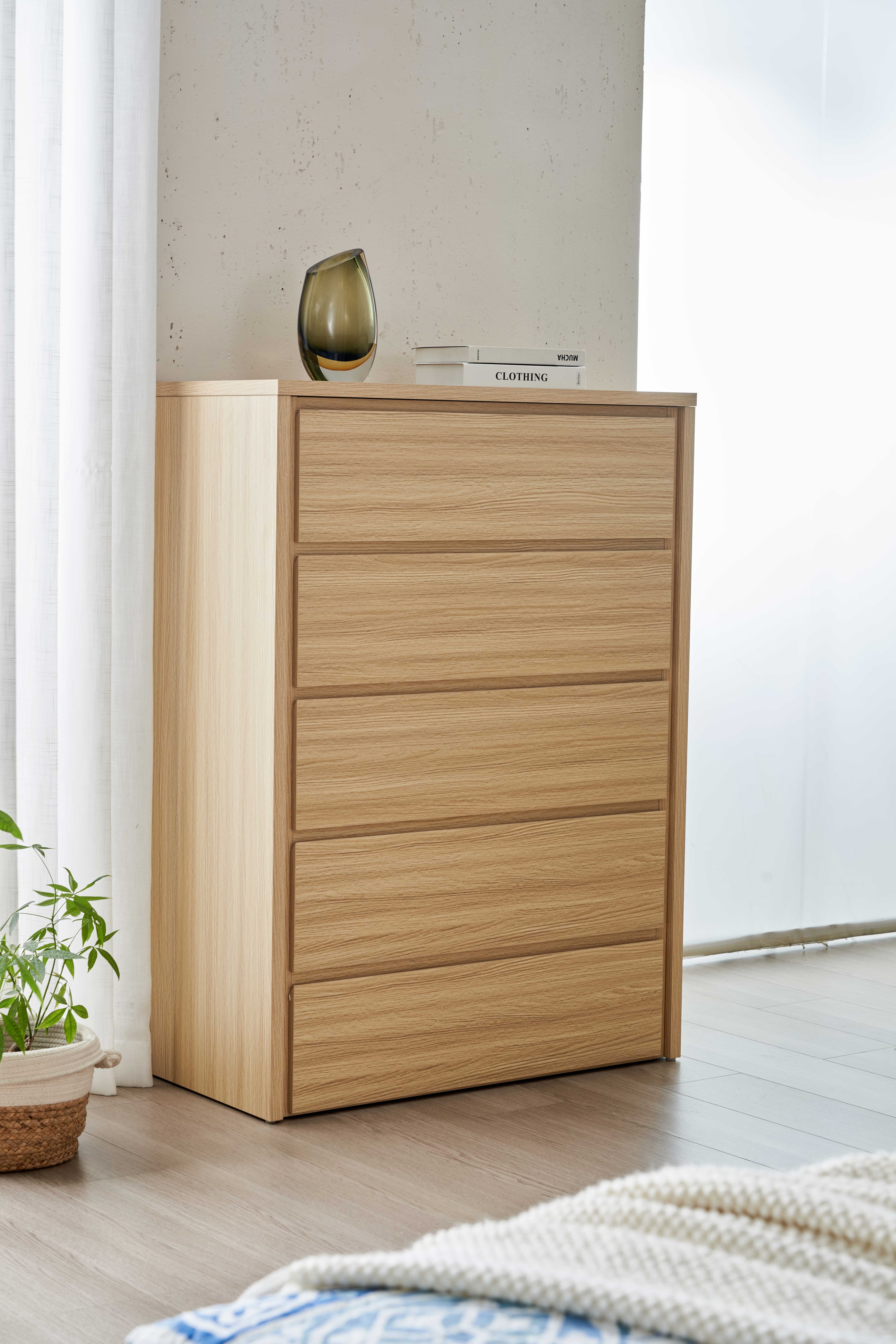 Lifestyle image of the  Nova Alpine Oak Tallboy 5 Drawer from Forty Winks