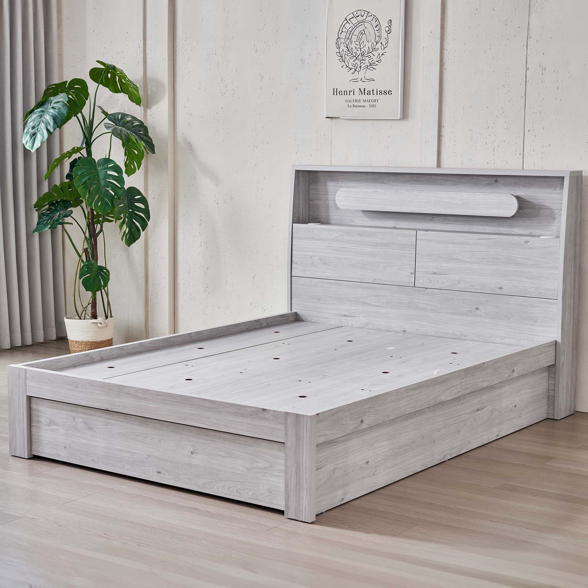 Lifestyle image of the  Nova Stone Oak Qb Bed W/Side Board Lift & End Drawer from Forty Winks