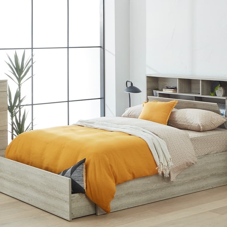 Lifestyle image of the Argo Rustic Ash Qb Bed W/Gas Lift & End Drawer Base from Forty Winks